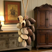 Load image into Gallery viewer, Handmade nutshell wind chime, nutshells rustling in the wind, bringing a touch of mountain forest atmosphere to your home.