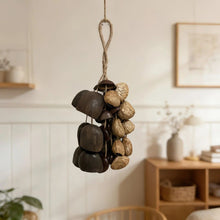 Load image into Gallery viewer, Handmade nutshell wind chime, nutshells rustling in the wind, bringing a touch of mountain forest atmosphere to your home.

