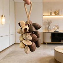 Load image into Gallery viewer, Handmade nutshell wind chime, nutshells rustling in the wind, bringing a touch of mountain forest atmosphere to your home.
