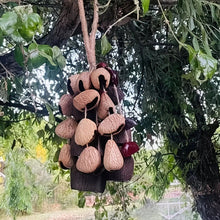 Load image into Gallery viewer, Handmade nutshell wind chime, nutshells rustling in the wind, bringing a touch of mountain forest atmosphere to your home.
