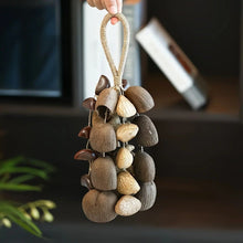 Load image into Gallery viewer, Handmade nutshell wind chime, nutshells rustling in the wind, bringing a touch of mountain forest atmosphere to your home.
