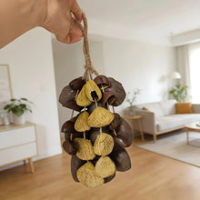 Load image into Gallery viewer, Handmade nutshell wind chime, nutshells rustling in the wind, bringing a touch of mountain forest atmosphere to your home.
